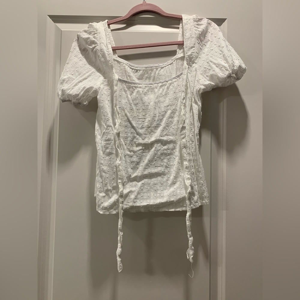 Bow-back white Swiss dot blouse